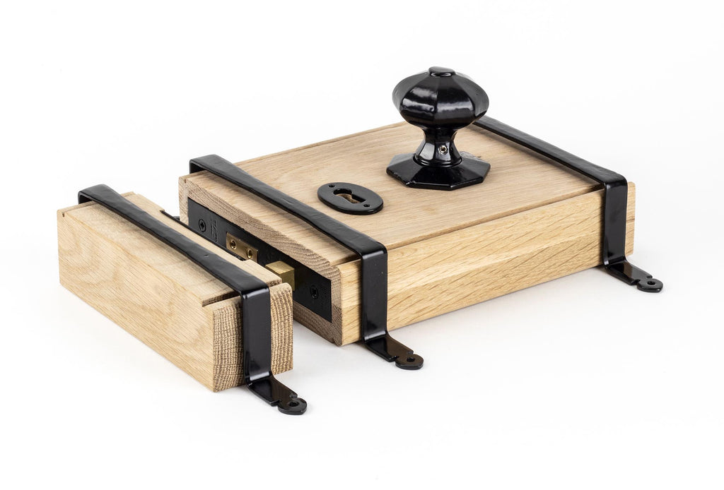 From The Anvil's Black Oak Box Lock & Octagonal Knob Set