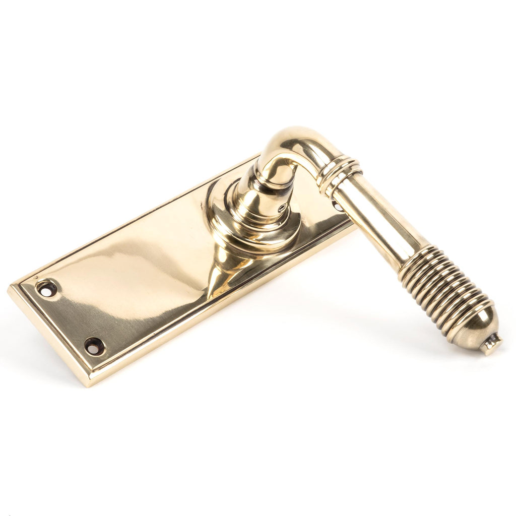 From The Anvil's Aged Brass Reeded Lever Latch Set