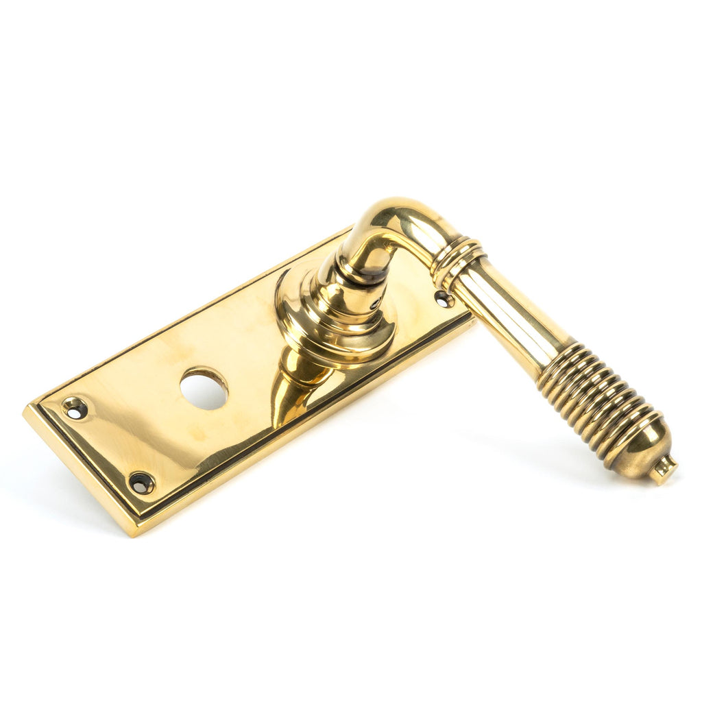 From The Anvil's Aged Brass Reeded Lever Bathroom Set