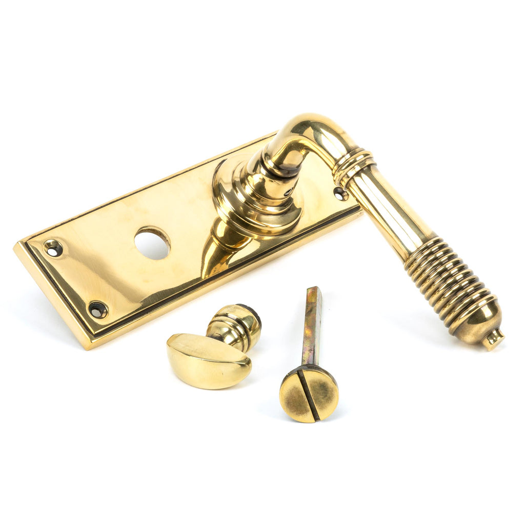 From The Anvil's Aged Brass Reeded Lever Bathroom Set