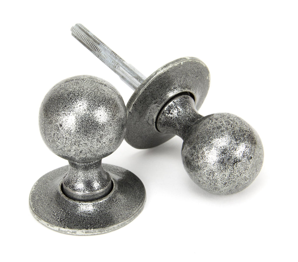 From The Anvil's Pewter Patina Round Mortice/Rim Knob Set