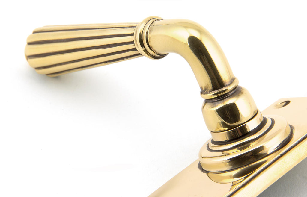 From The Anvil's Aged Brass Hinton Lever Bathroom Set