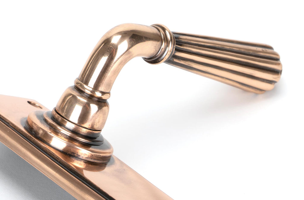 From The Anvil's Polished Bronze Hinton Lever Bathroom Set