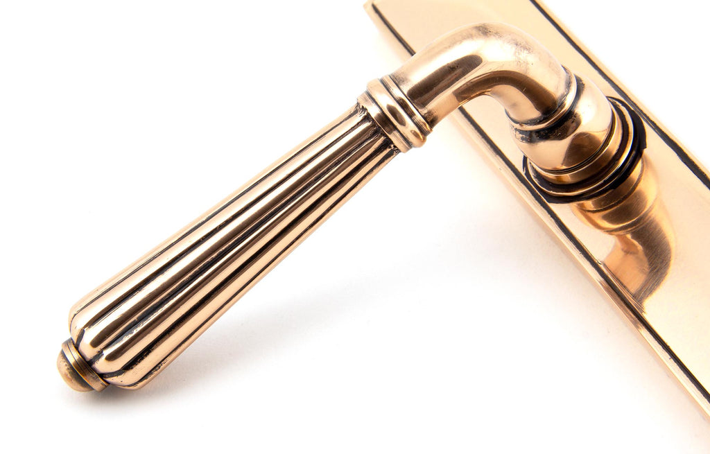 From The Anvil's Polished Bronze Hinton Slimline Lever Espag. Lock Set