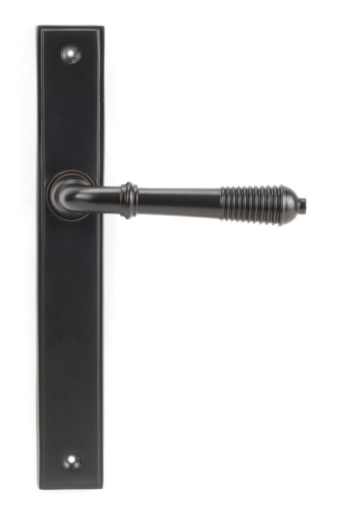 From The Anvil's Aged Bronze Reeded Slimline Lever Espag. Latch Set