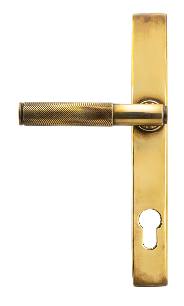 From The Anvil's Aged Brass Brompton Slimline Lever Espag. Lock Set