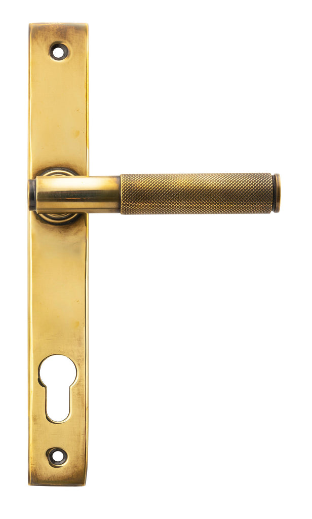 From The Anvil's Aged Brass Brompton Slimline Lever Espag. Lock Set