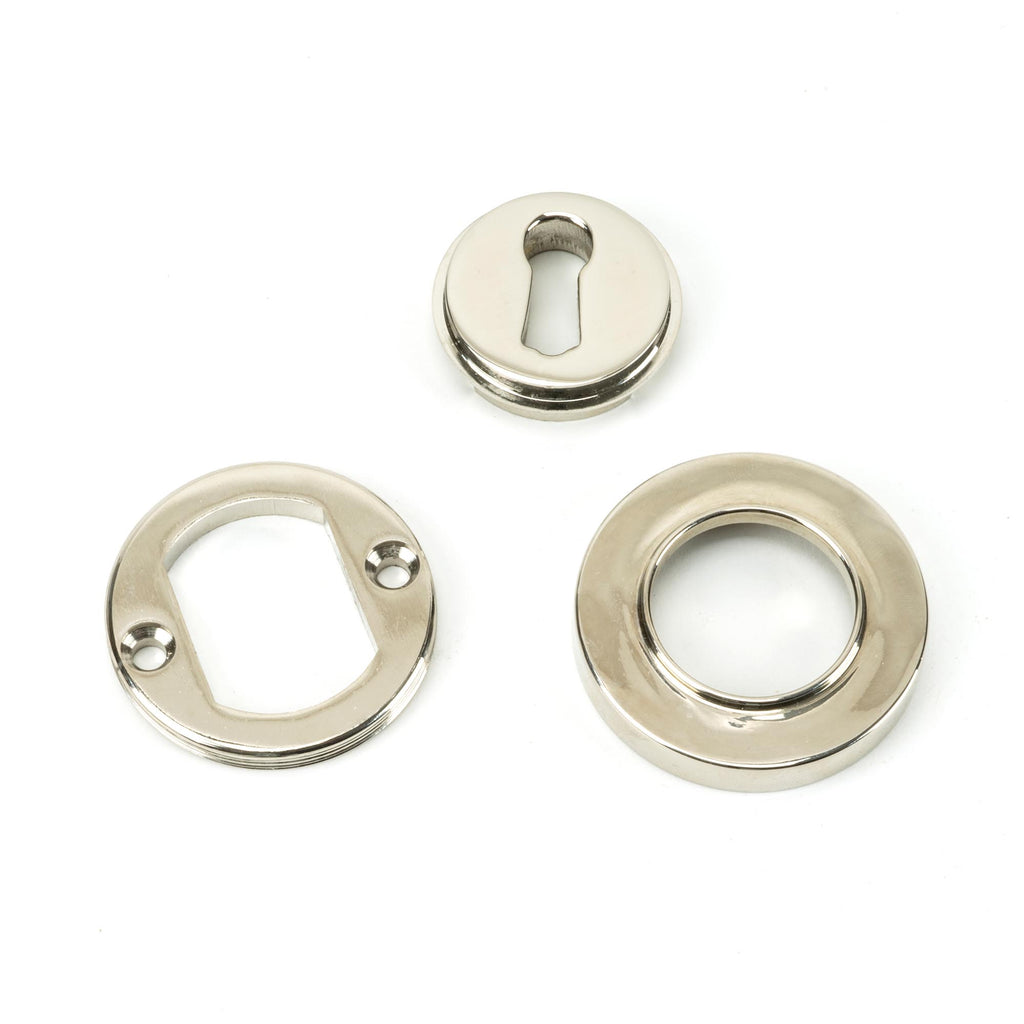 From The Anvil's Polished Nickel Round Escutcheon