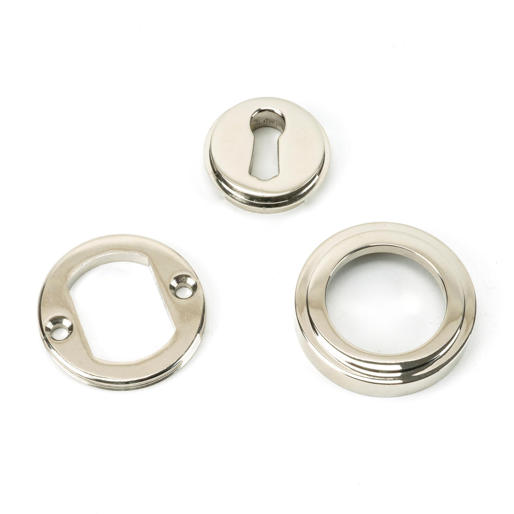 From The Anvil's Polished Nickel Round Escutcheon