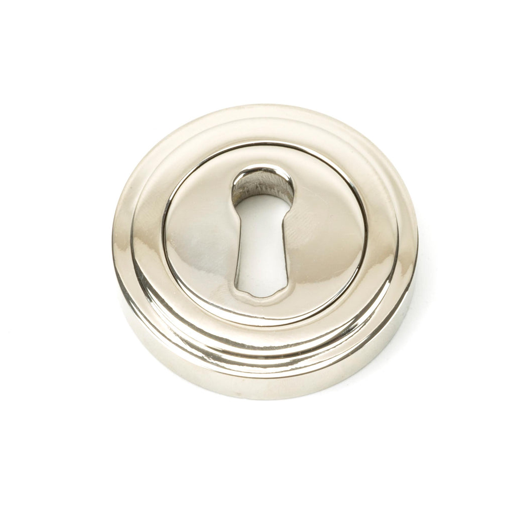 From The Anvil's Polished Nickel Round Escutcheon