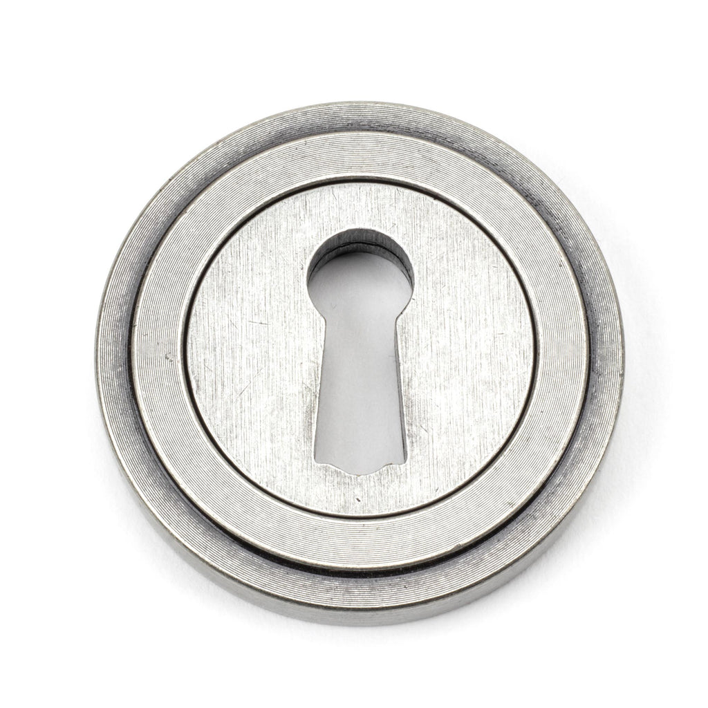 From The Anvil's Pewter Patina Round Escutcheon