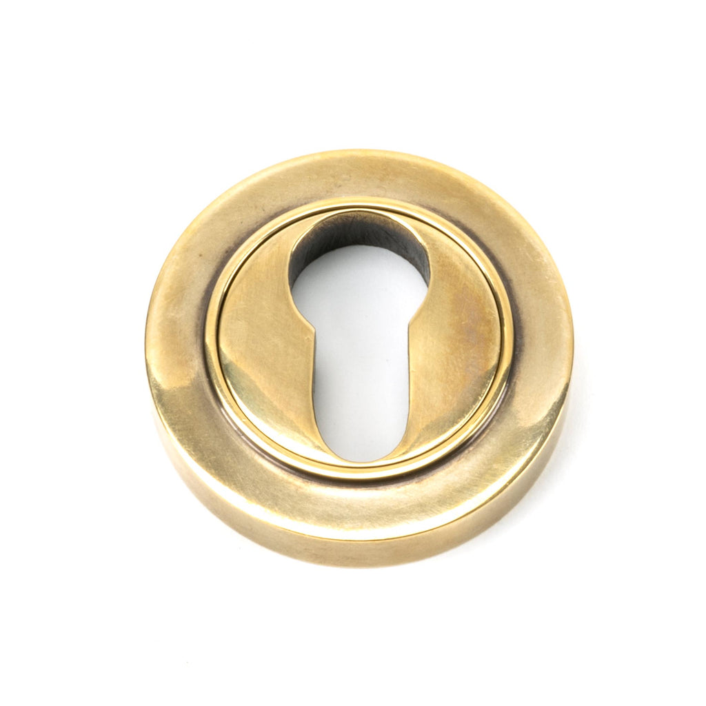 From The Anvil's Aged Brass Round Euro Escutcheon