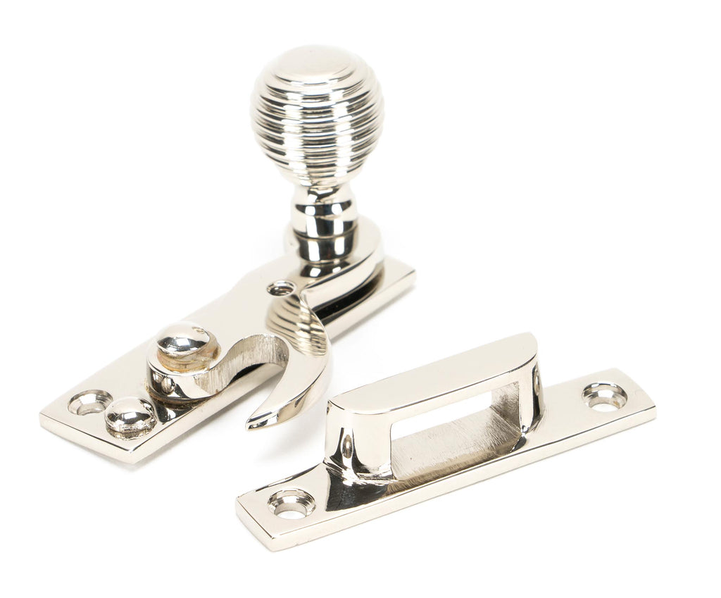 From The Anvil's Polished Nickel Beehive Sash Hook Fastener