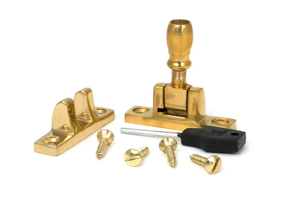 From The Anvil's Polished Brass Mushroom Brighton Fastener