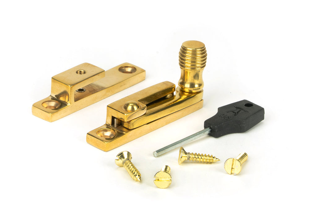 From The Anvil's Polished Brass Beehive Quadrant Fastener - Narrow