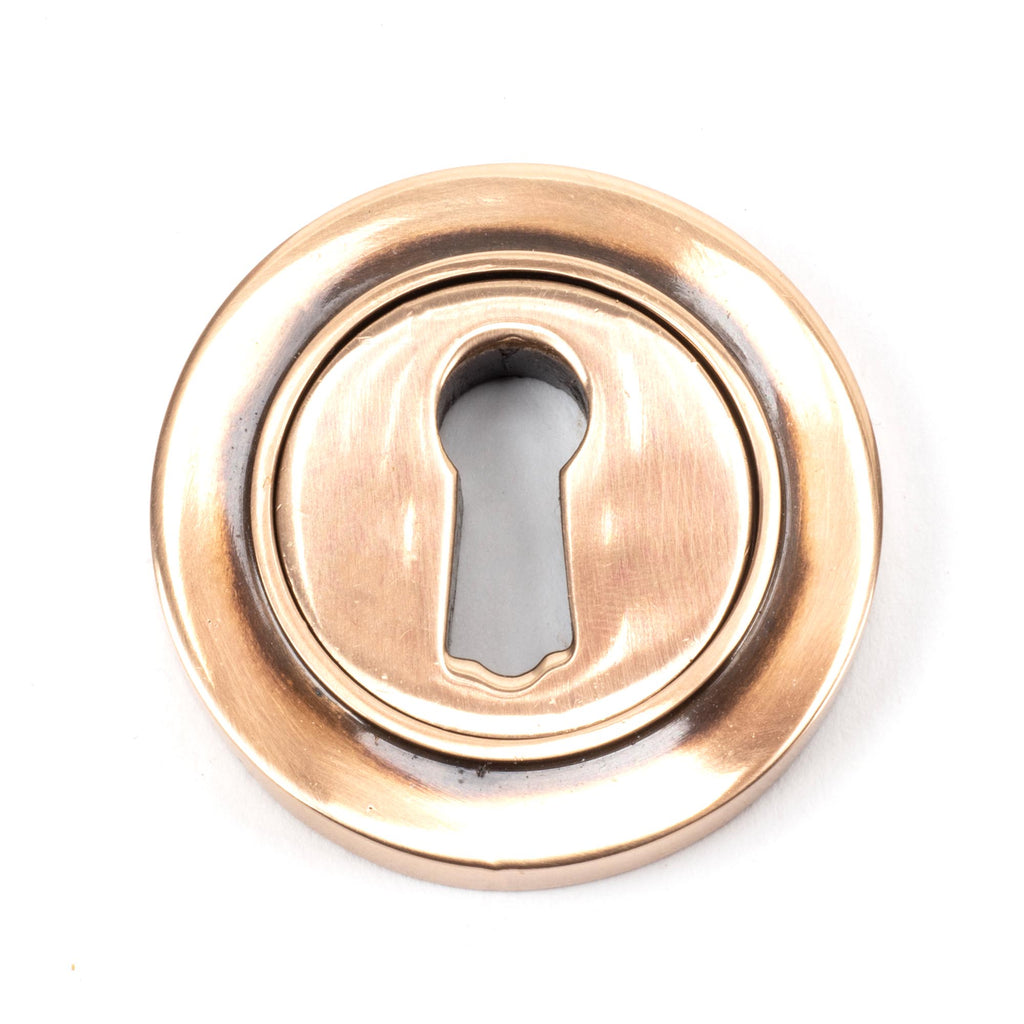 From The Anvil's Polished Bronze Round Escutcheon