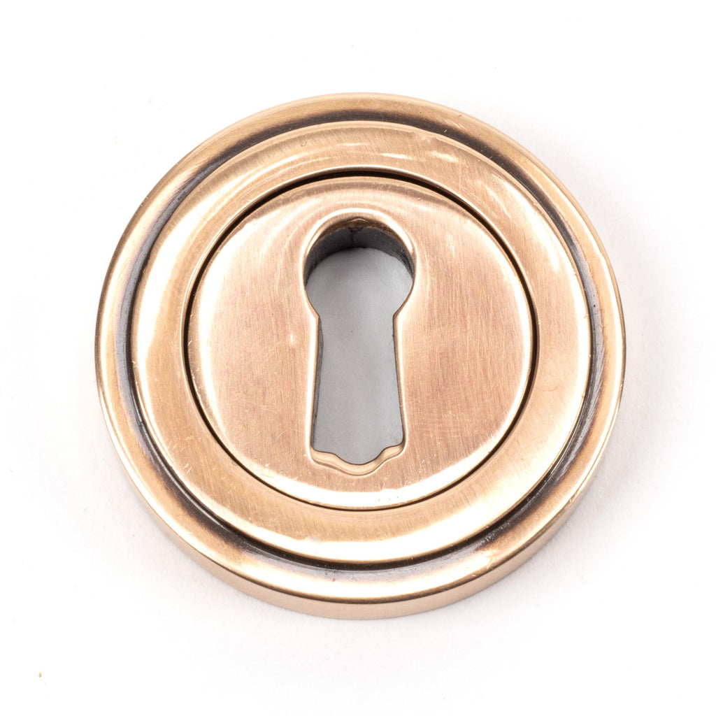 From The Anvil's Polished Bronze Round Escutcheon