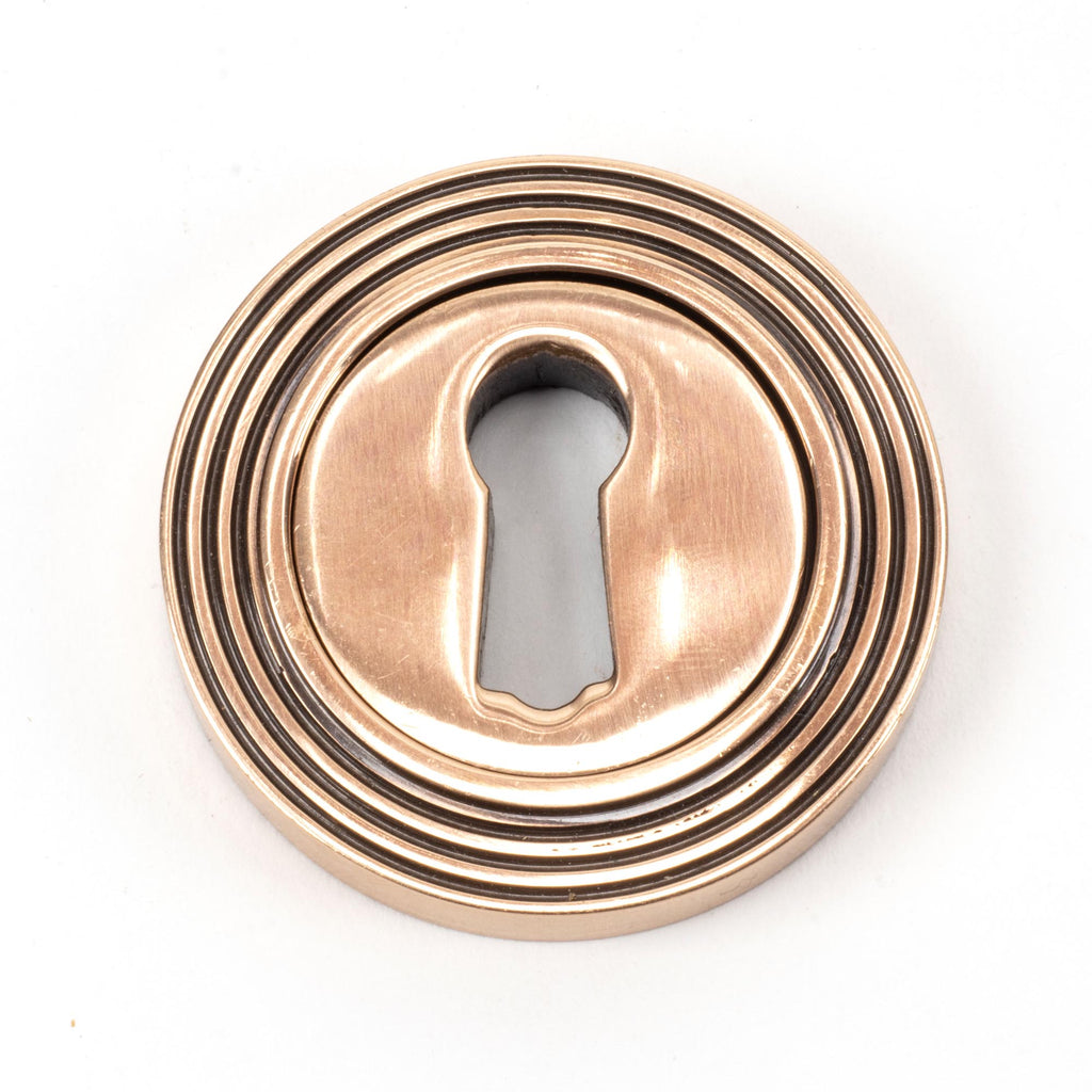 From The Anvil's Polished Bronze Round Escutcheon