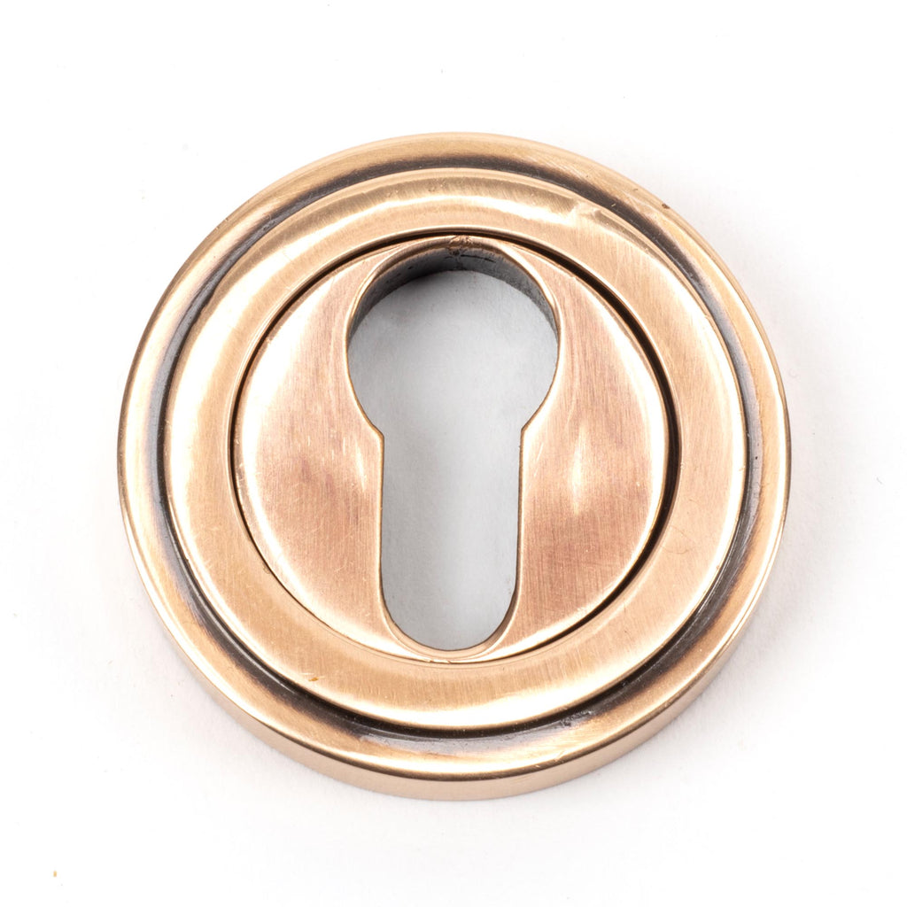 From The Anvil's Polished Bronze Round Euro Escutcheon