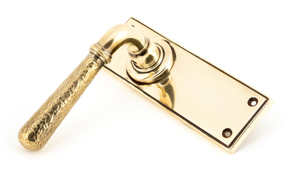 From The Anvil's Aged Brass Hammered Newbury Lever Latch Set