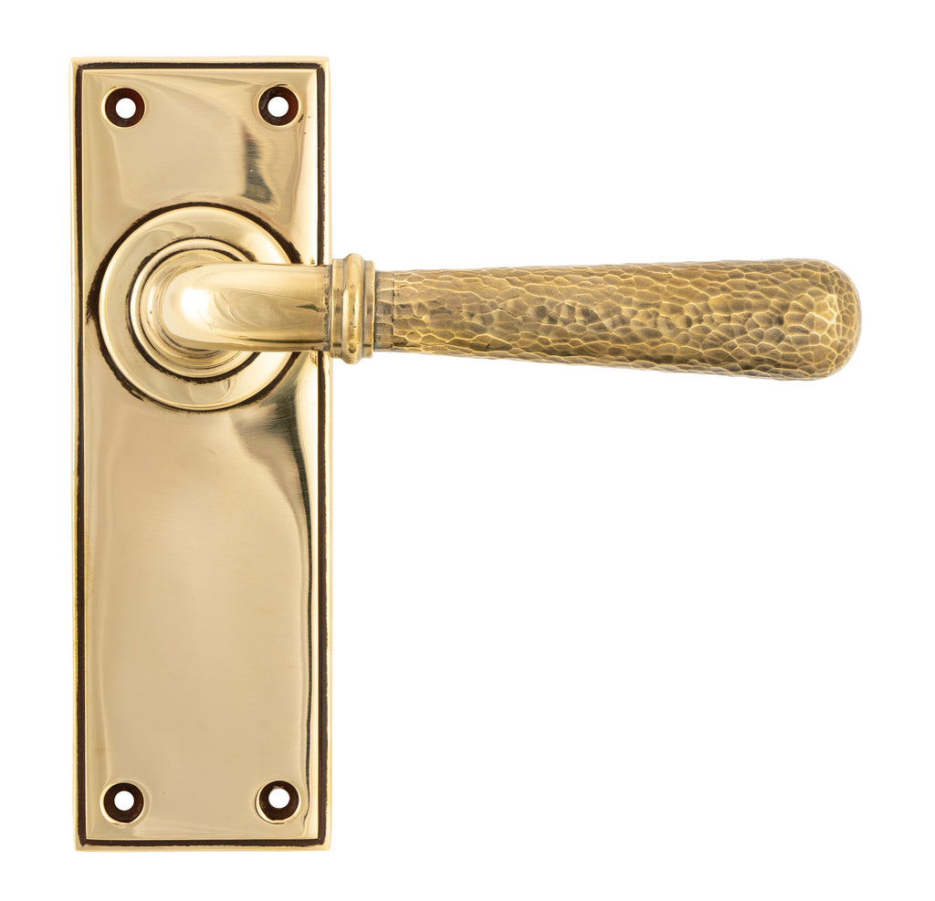 From The Anvil's Aged Brass Hammered Newbury Lever Latch Set