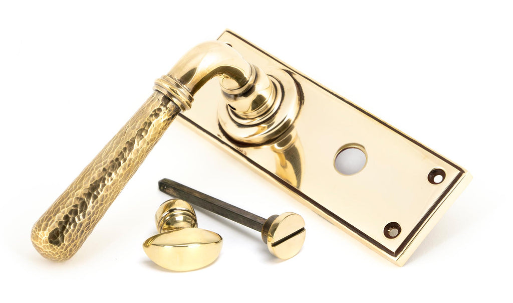 From The Anvil's Aged Brass Hammered Newbury Lever Bathroom Set