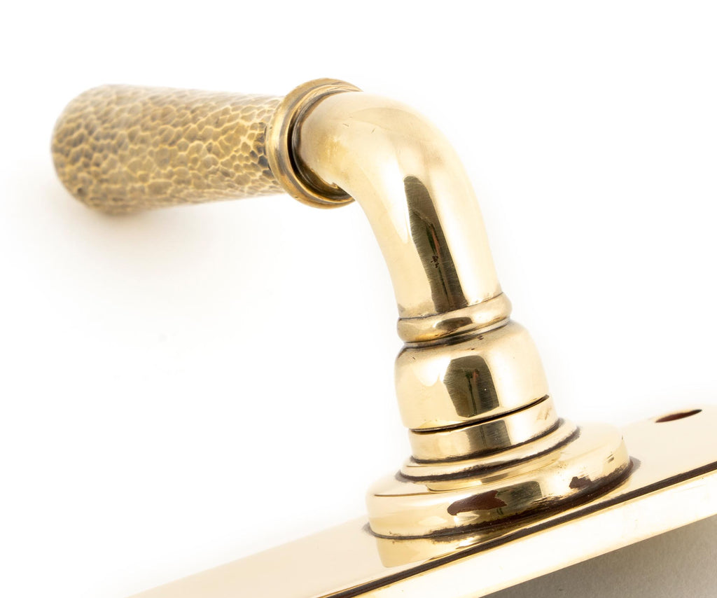 From The Anvil's Aged Brass Hammered Newbury Lever Bathroom Set