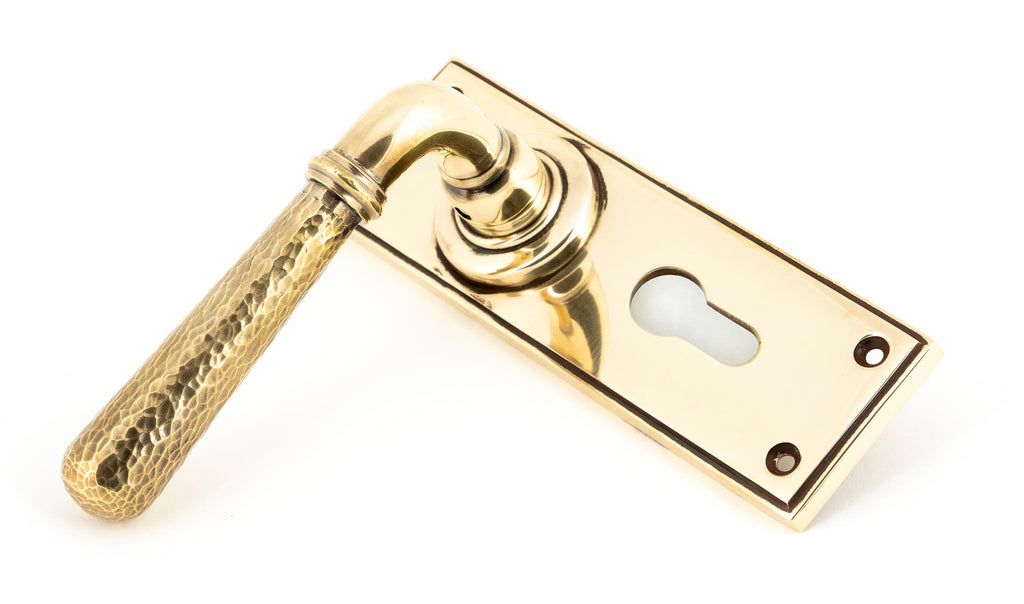 From The Anvil's Aged Brass Hammered Newbury Lever Euro Lock Set