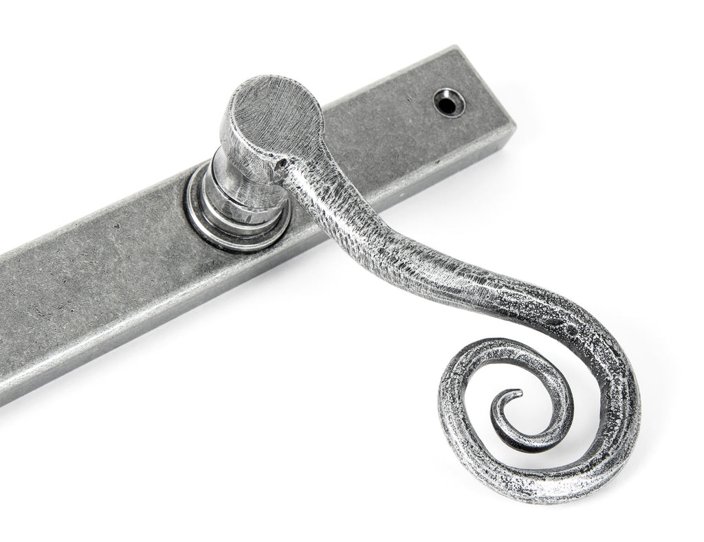 From The Anvil's Pewter Patina Monkeytail Slimline Lever Espag. Latch Set