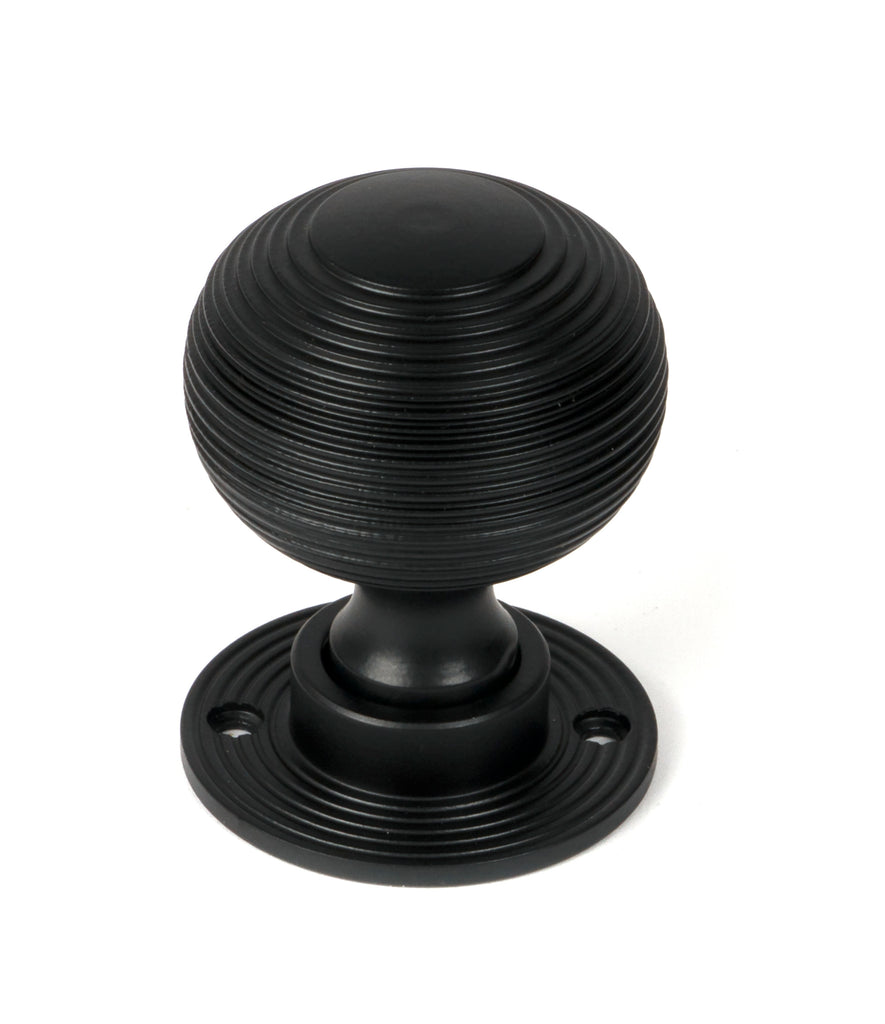 From The Anvil's Matt Black Heavy Beehive Mortice/Rim Knob Set