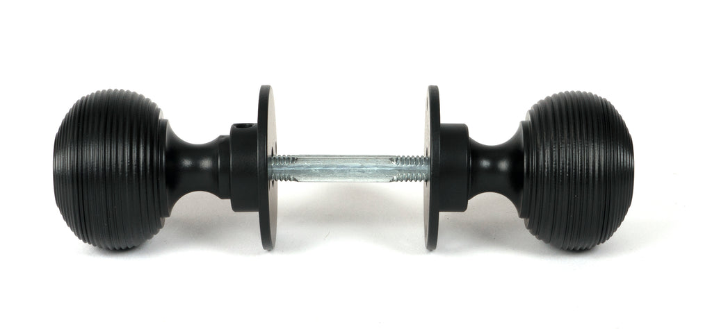 From The Anvil's Matt Black Heavy Beehive Mortice/Rim Knob Set