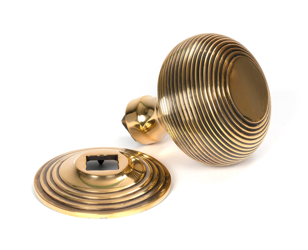 From The Anvil's Aged Brass Beehive Centre Door Knob