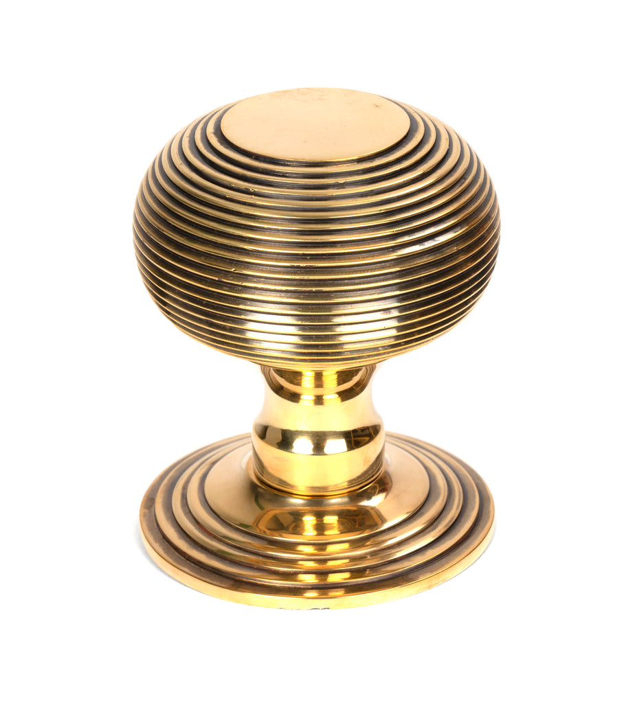 From The Anvil's Aged Brass Beehive Centre Door Knob