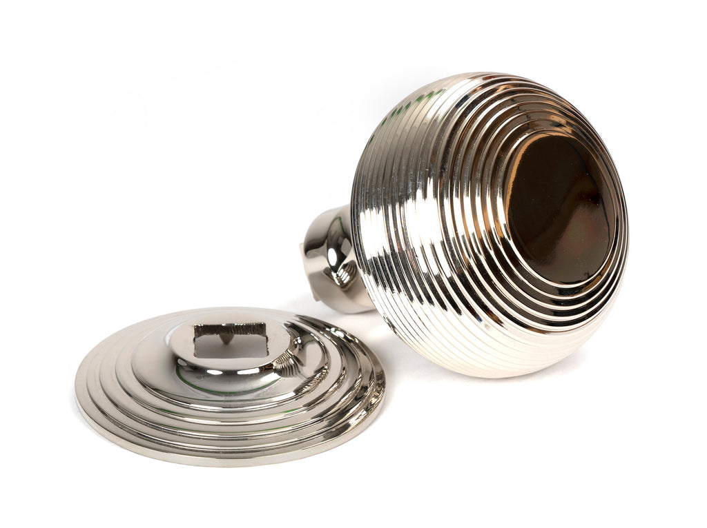 From The Anvil's Polished Nickel Beehive Centre Door Knob