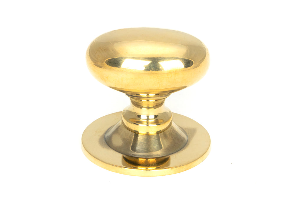 From The Anvil's Aged Brass Oval Cabinet Knob