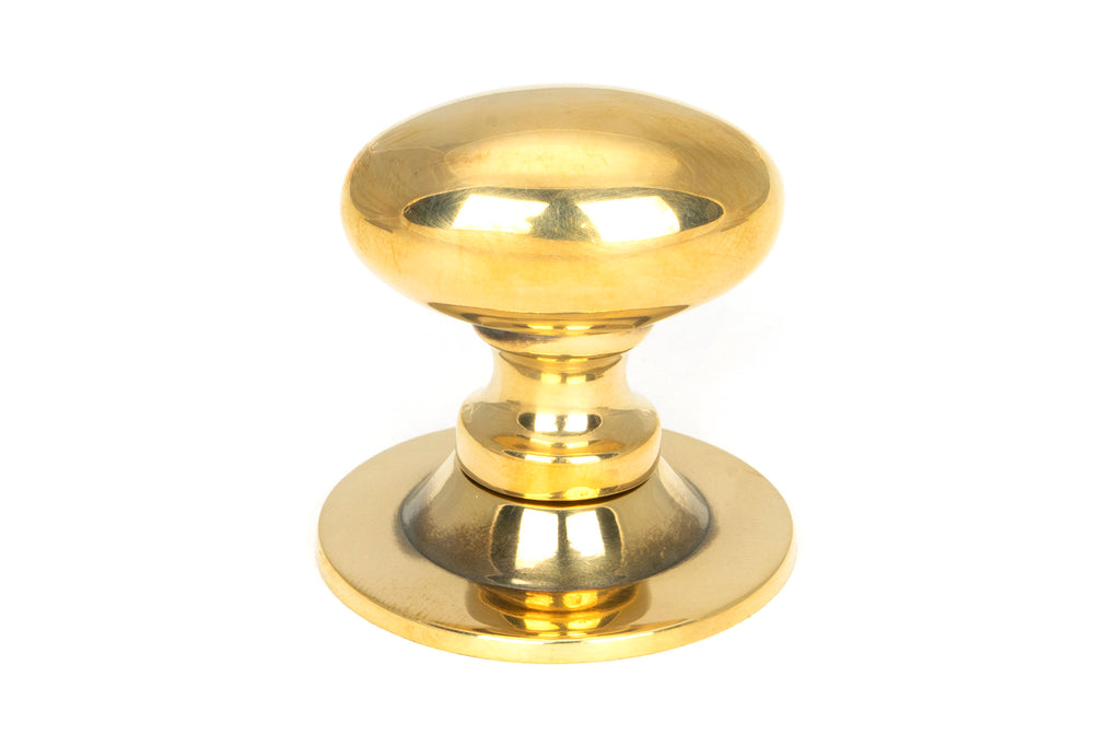 From The Anvil's Aged Brass Oval Cabinet Knob