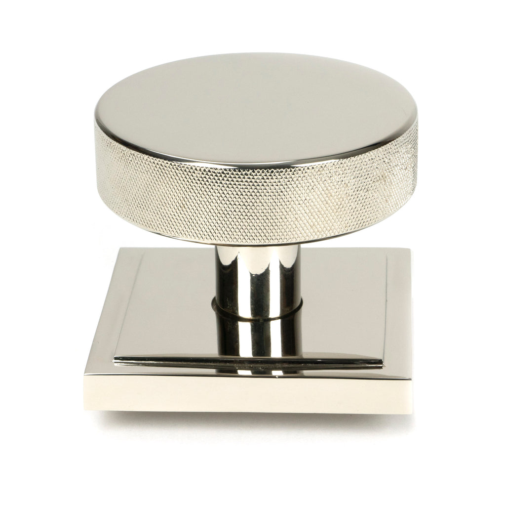 From The Anvil's Polished Nickel Brompton Centre Door Knob