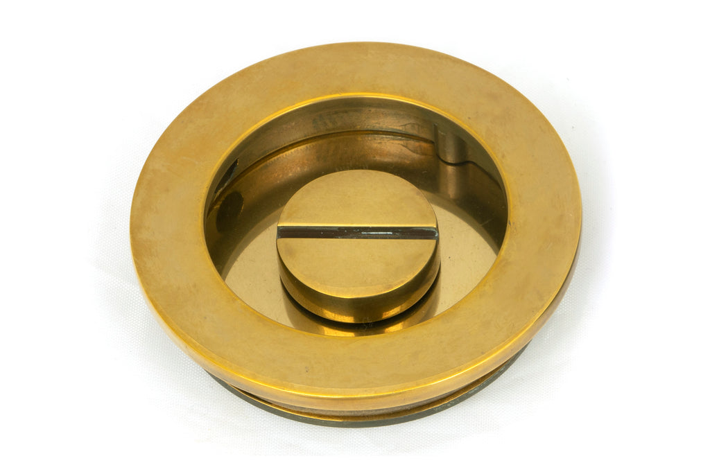 From The Anvil's Aged Brass Plain Round Pull - Privacy Set