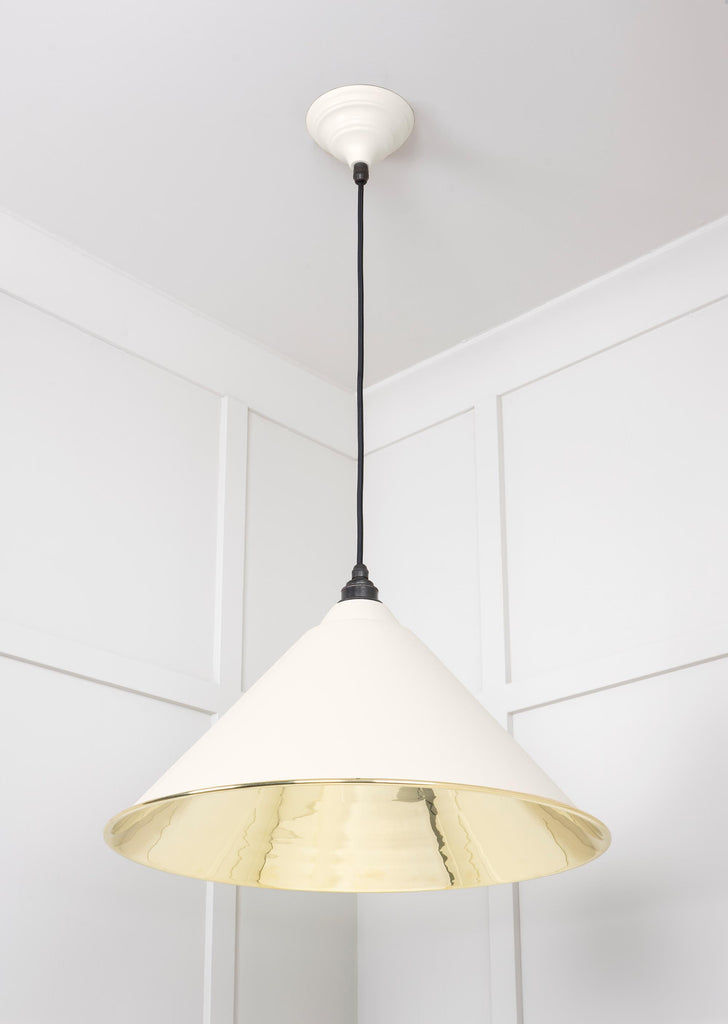 From The Anvil's Smooth Brass Smooth Brass Hockley Pendant