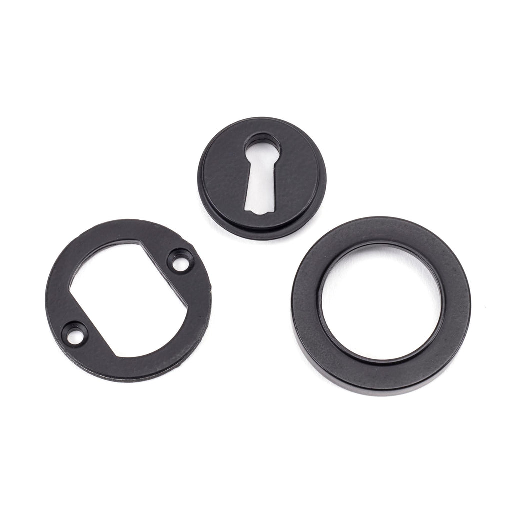 From The Anvil's Matt Black Round Escutcheon