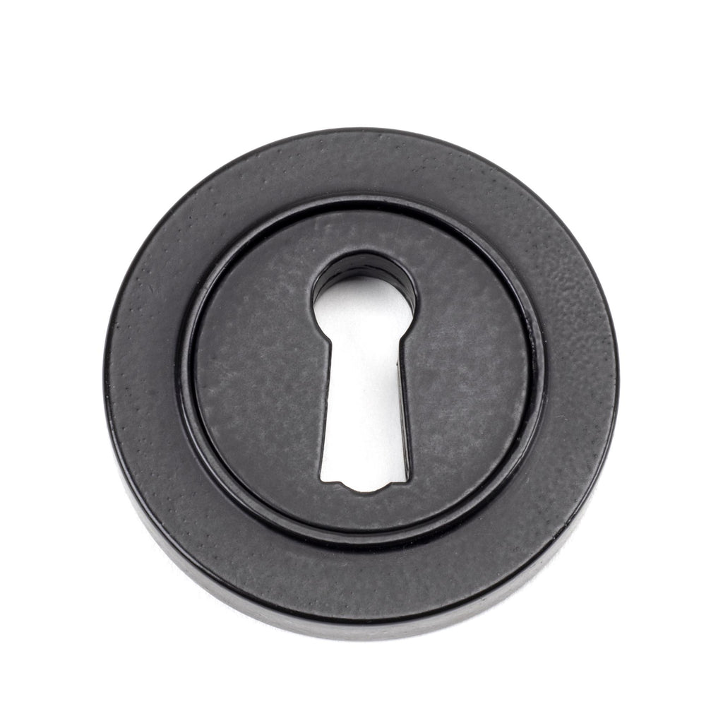 From The Anvil's Matt Black Round Escutcheon