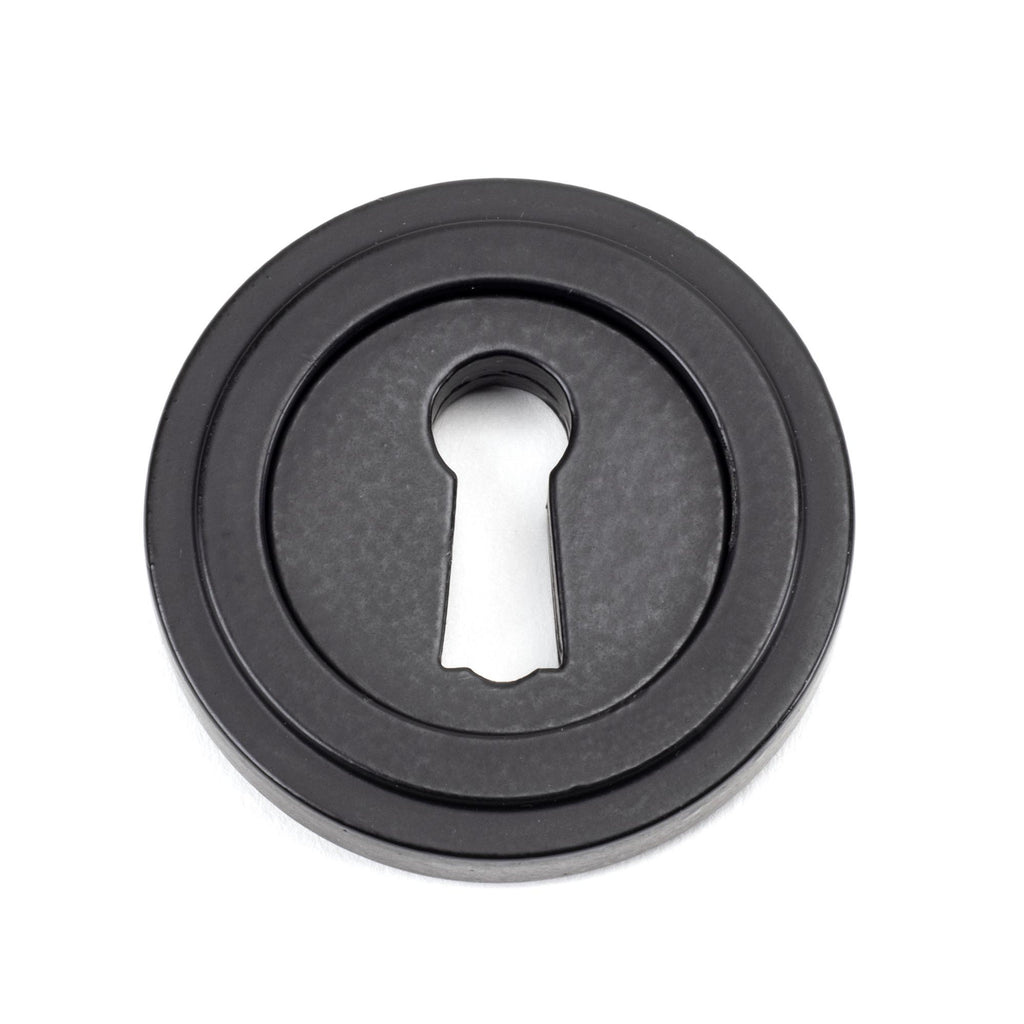 From The Anvil's Matt Black Round Escutcheon