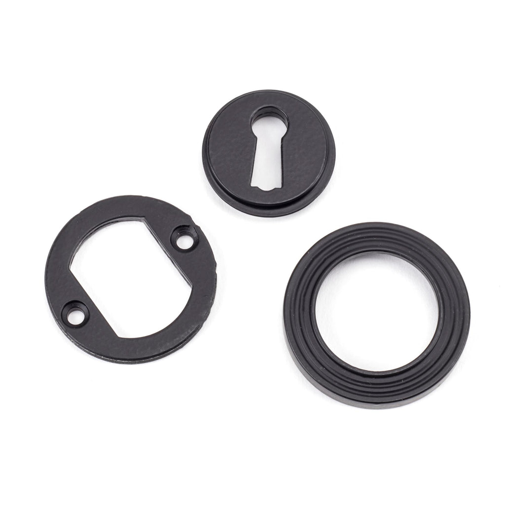 From The Anvil's Matt Black Round Escutcheon