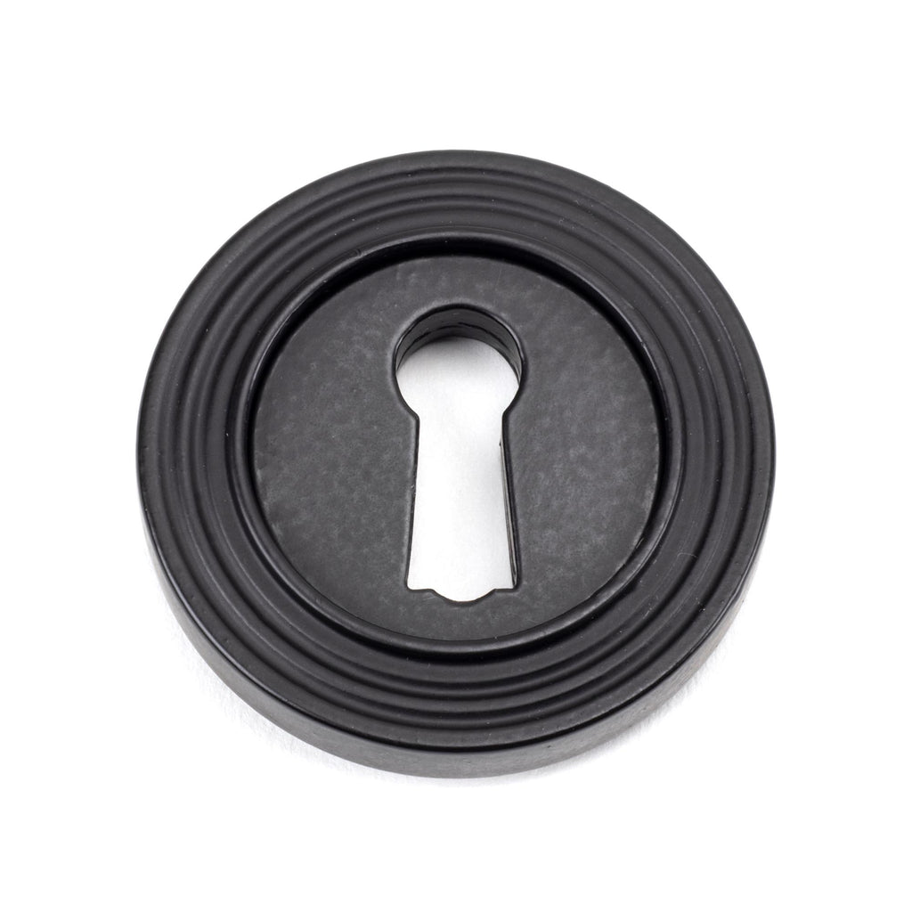 From The Anvil's Matt Black Round Escutcheon