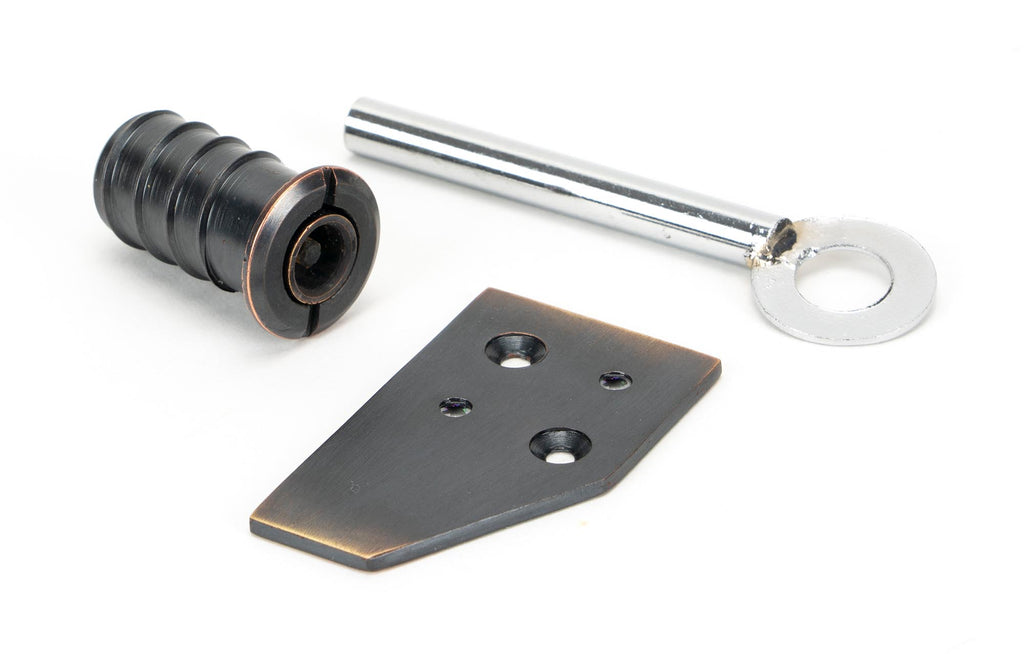 From The Anvil's Aged Bronze Key-Flush Sash Stop