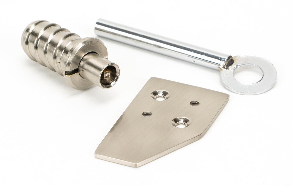 From The Anvil's Polished Nickel Key-Flush Sash Stop