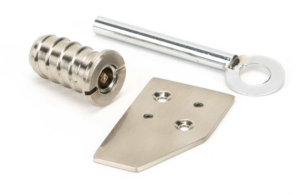 From The Anvil's Polished Nickel Key-Flush Sash Stop