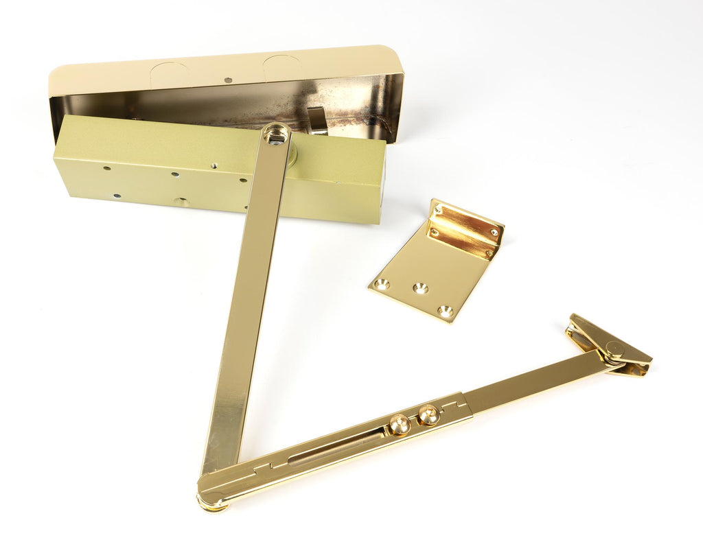 From The Anvil's Polished Brass Size 2-5 Door Closer