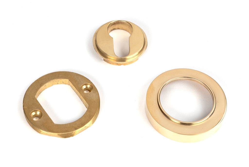 From The Anvil's Polished Brass Round Euro Escutcheon