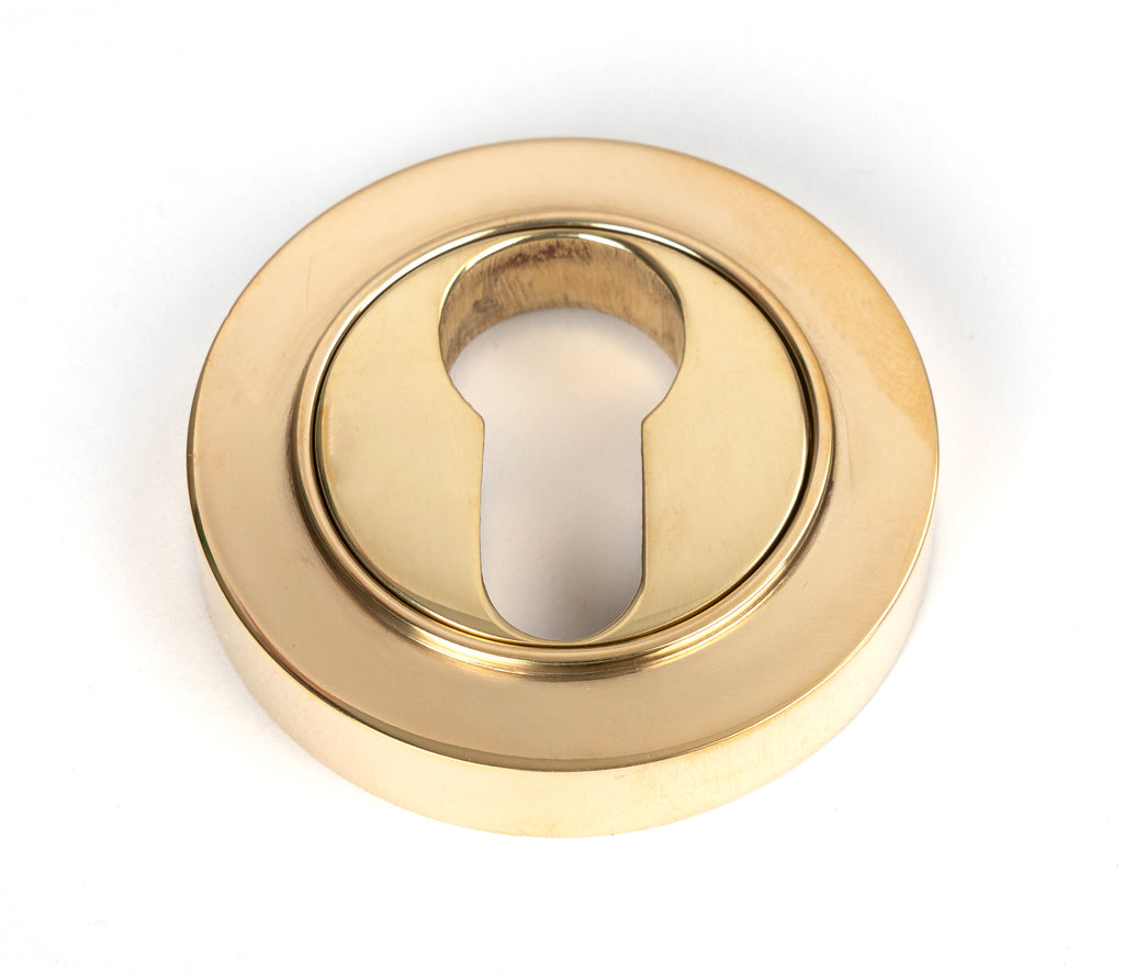 From The Anvil's Polished Brass Round Euro Escutcheon